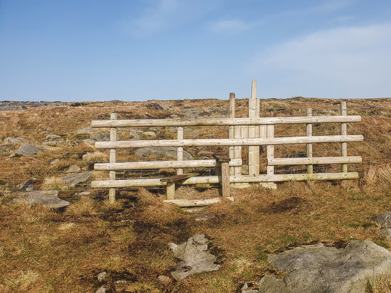 Fence and wooden stile